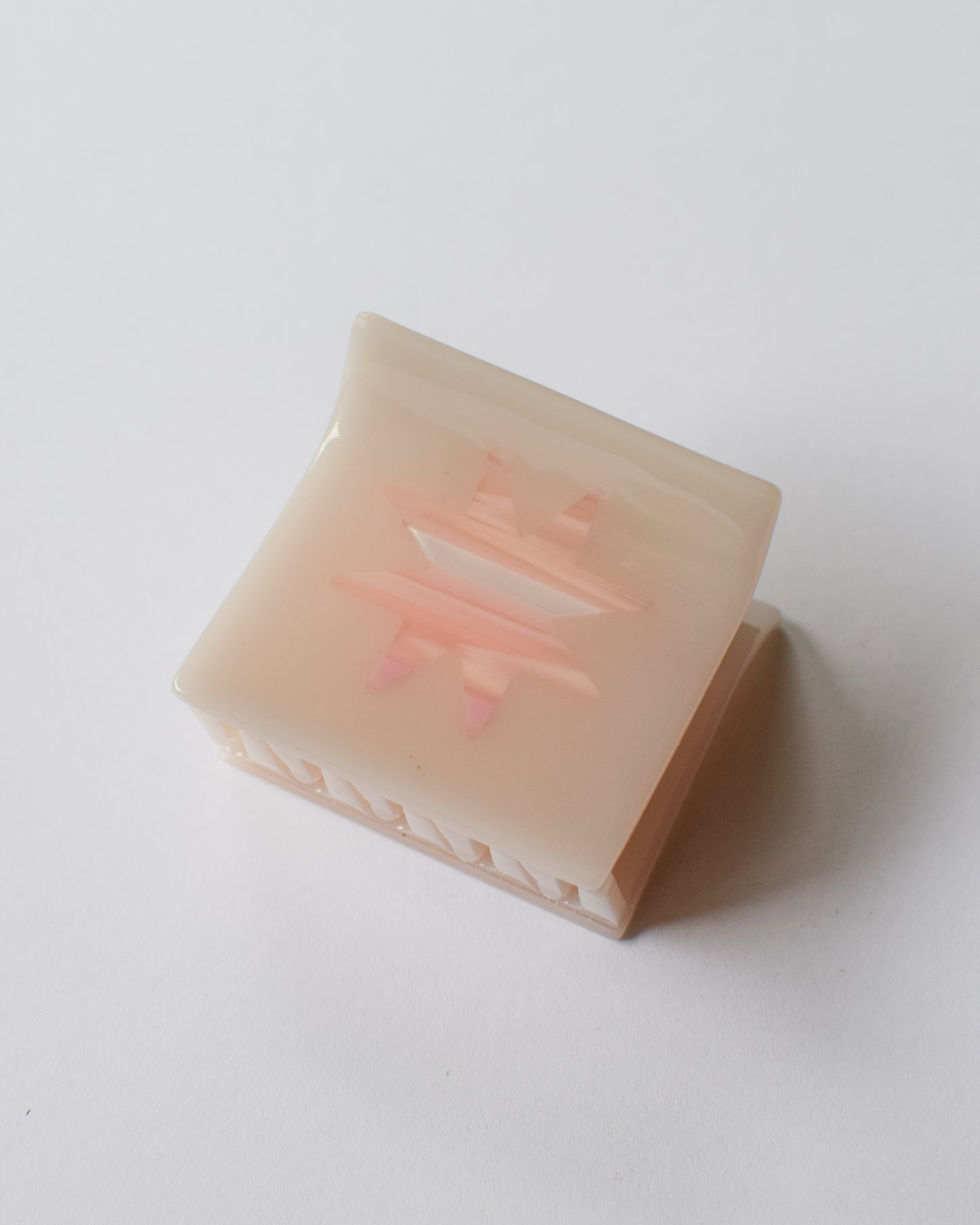 Worn Pink Sawtooth Star Claw